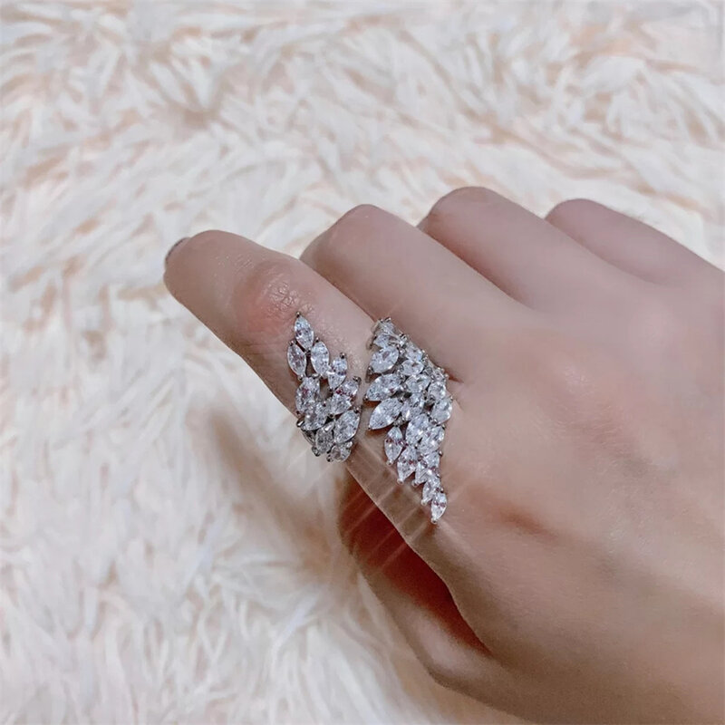 ZAKOL Fashion White Gold Color Zirconia Leaf Open Rings for Girl Trendy Crystal Wing Finger Adjust Ring Party Women Jewelry