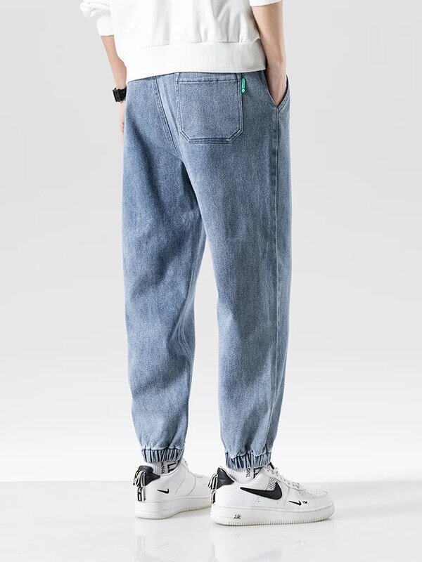Primavera estate nero blu Jeans larghi uomo Streetwear Denim Joggers pantaloni Casual in cotone Harem pantaloni Jean Plus Size 6XL 7XL 8XL
