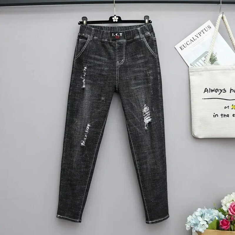 Musim Semi Summe Jeans Ibu Ukuran Besar Jeans Longgar Pinggang Tinggi Elastis untuk Wanita Jeans Sobek Denim Celana Harem Longgar Wanita