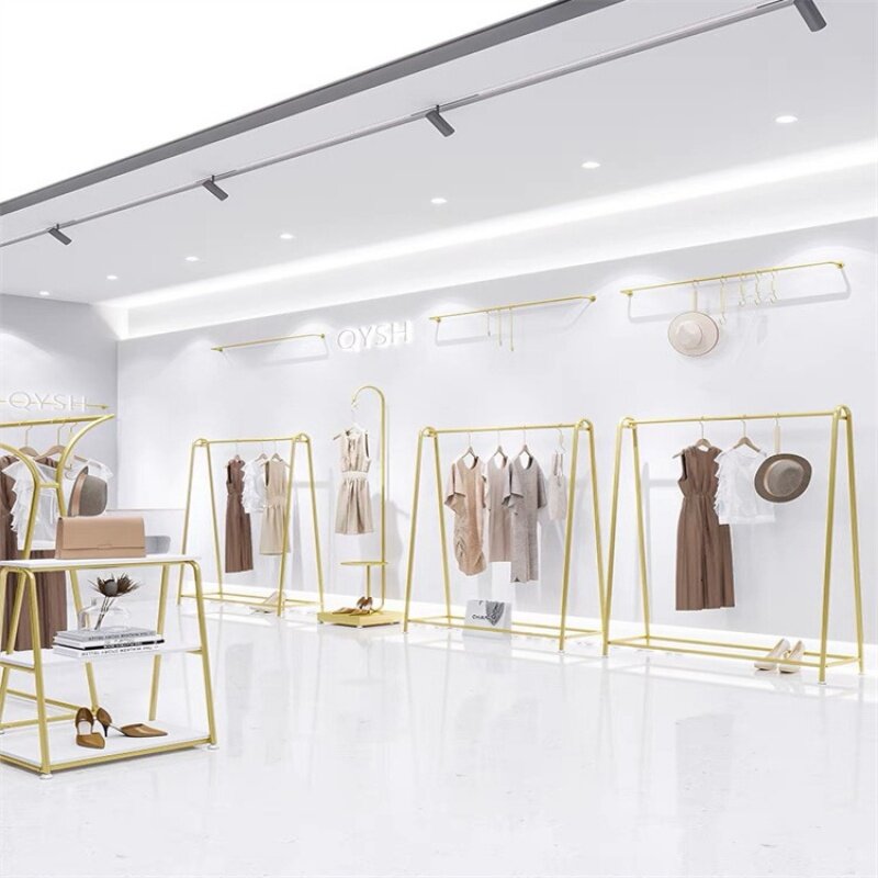 Juego de ropa montado en la pared personalizado, estante de ropa de Boutique, exhibición de riel dorado