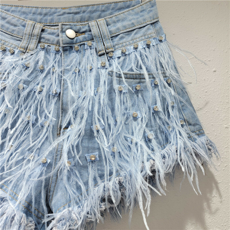 Europejskie 2024 lato nowe wykwintne strusie pióra z kryształami górskimi Slim Fit szorty z frędzlami moda Streetwear damskie spodenki jeansowe