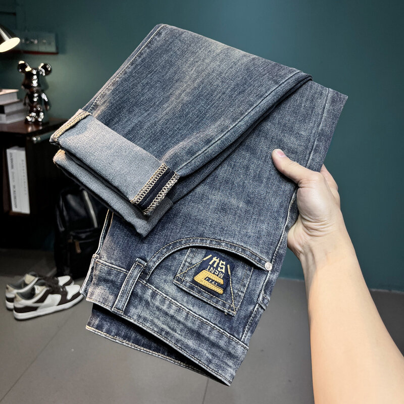 Новинка весна-лето 2024 мужские джинсы с вышивкой облегающие Универсальные синие модные трендовые брюки для отдыха с эффектом потертости