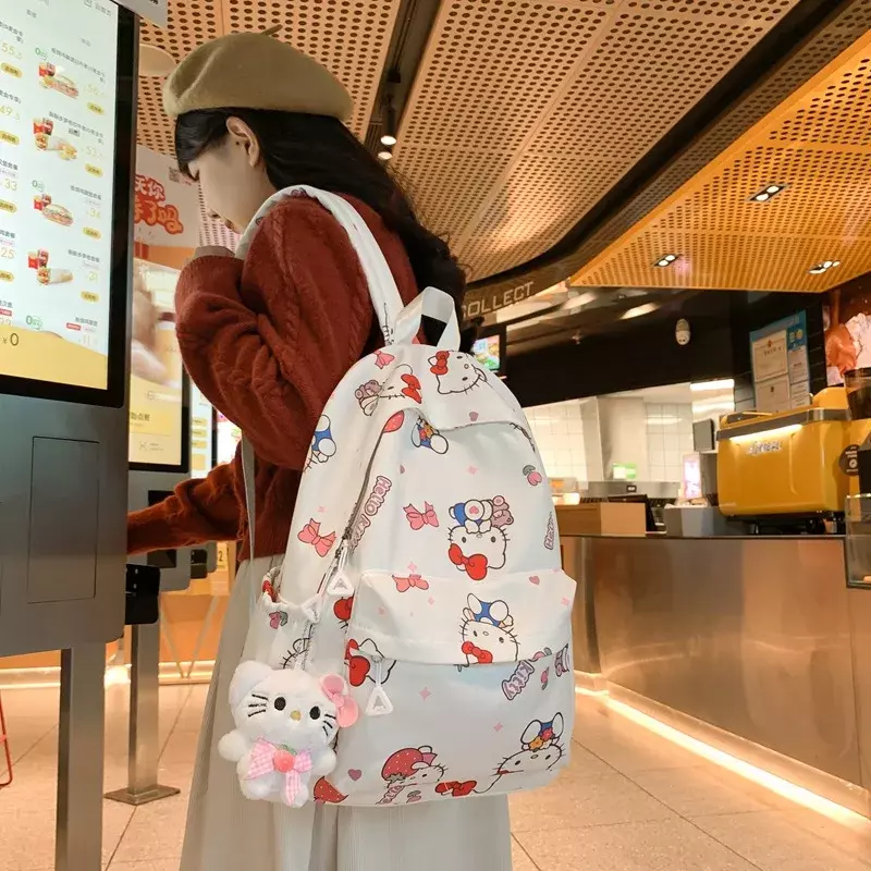 Hello Kitty graffiti student brush wave Hello Kitty backpack waterproof backpack Sanrio versatile school bag girl school bag