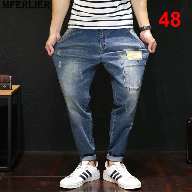 Celana Denim Vintage pria, celana Jeans ukuran Plus 48 kasual warna Solid, celana pensil ukuran besar untuk pria