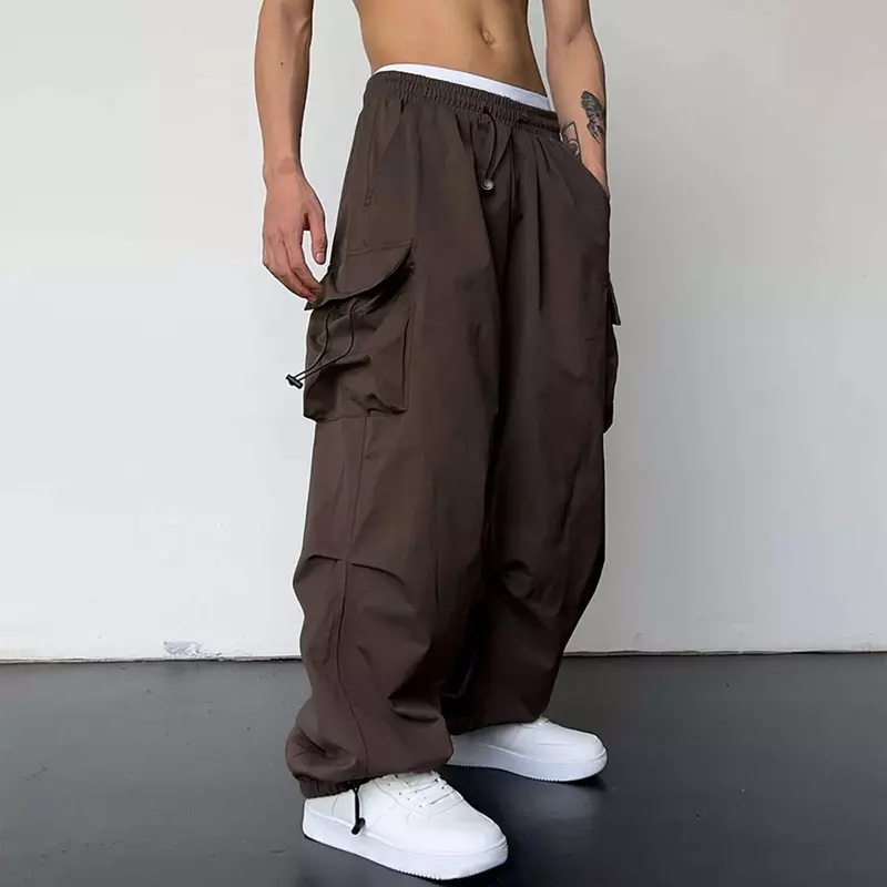 กางเกงคาร์โก้ผู้ชายกางเกงลำลองกางเกงสีทึบกระเป๋ากีฬากางเกงเชือกกางเกงสตรีทแวร์ผูกสะโพก
