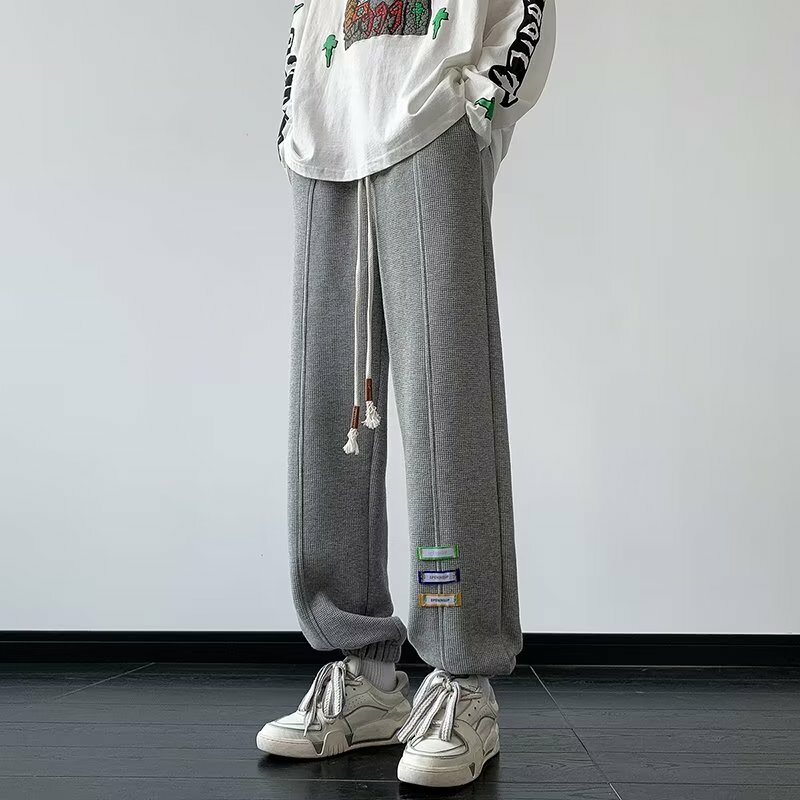 Y2K pantaloni larghi elastico in vita da uomo pantaloni larghi moda Streetwear uomo moda coreana con coulisse fasciata per uomo pantaloni larghi
