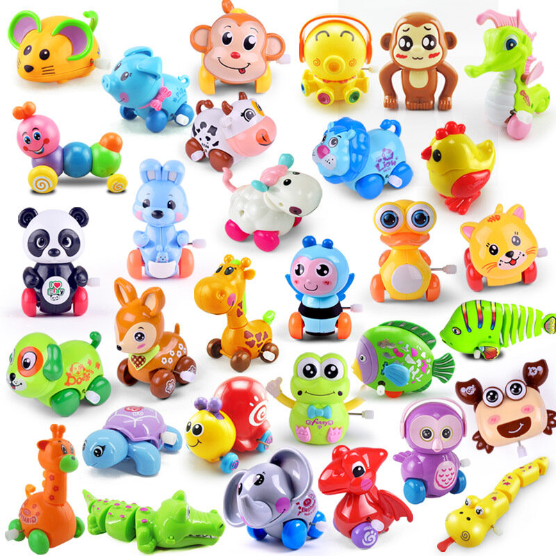 1 pezzi di colore casuale bambino divertente bambini giocattoli giocattolo orologio Mini animale tirare indietro salto cane/leone vento giocattoli per bambini ragazzi