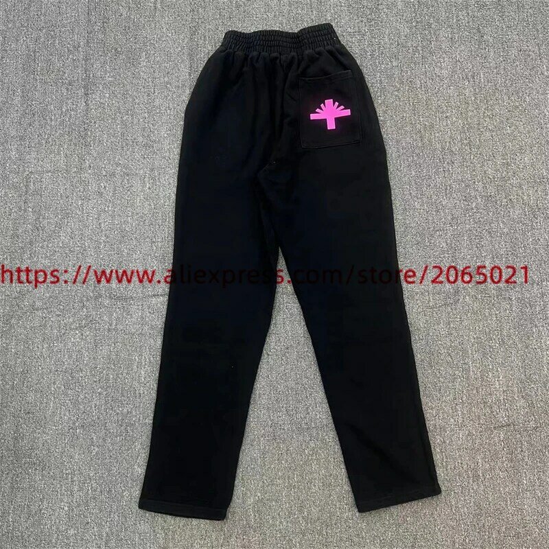 Pantaloni della tuta neri Vertabrae uomo donna pantaloni con stampa lettera rosa pantaloni della tuta da jogging pantaloni in spugna