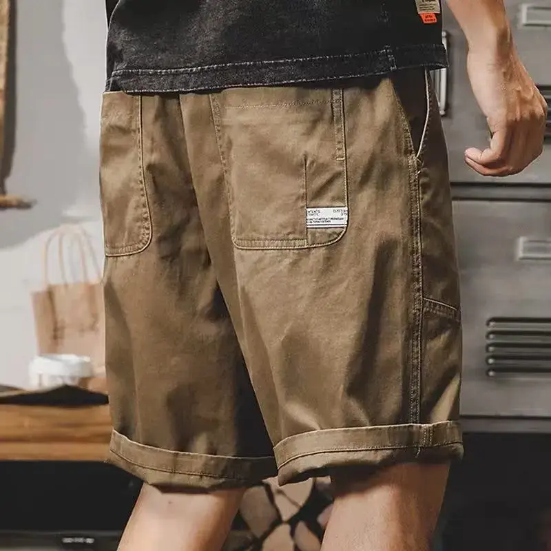 Pantalones cortos Cargo para hombre, Shorts de senderismo con cintura elástica, color negro, de lujo, anchos, informales, a la moda, para verano, 2024