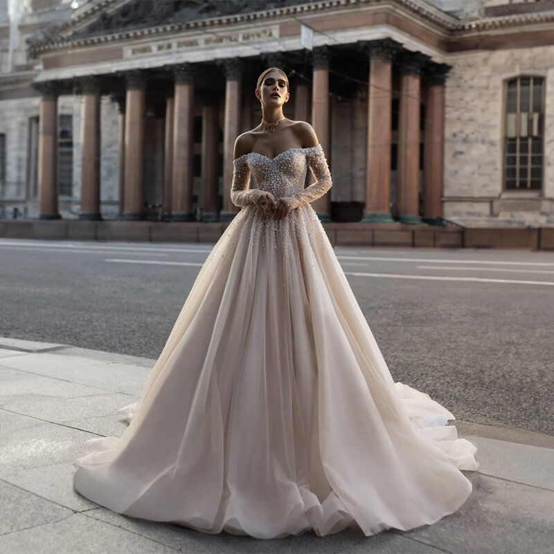 Gaun pengantin mewah bahu terbuka Tulle manik-manik mutiara untuk wanita gaun pernikahan panjang payet lengan A-line gaun pernikahan istana 2024
