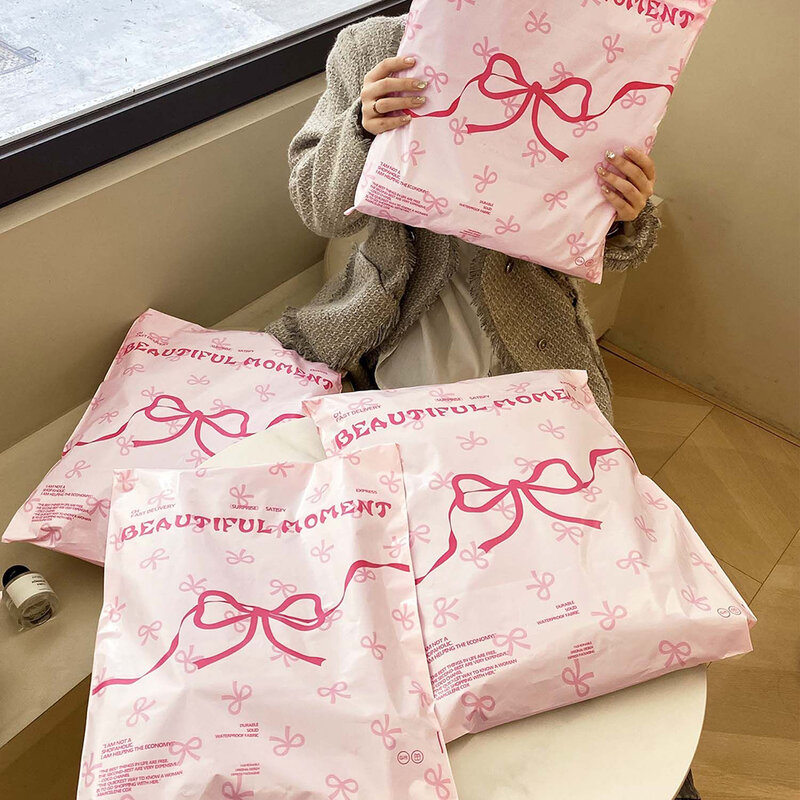 50Pcs Pink Plastic Courier Bags Bow knot Printed Express Envelope Clothing Packing Shipping Envelopes Self Adhesive Mailing Bag