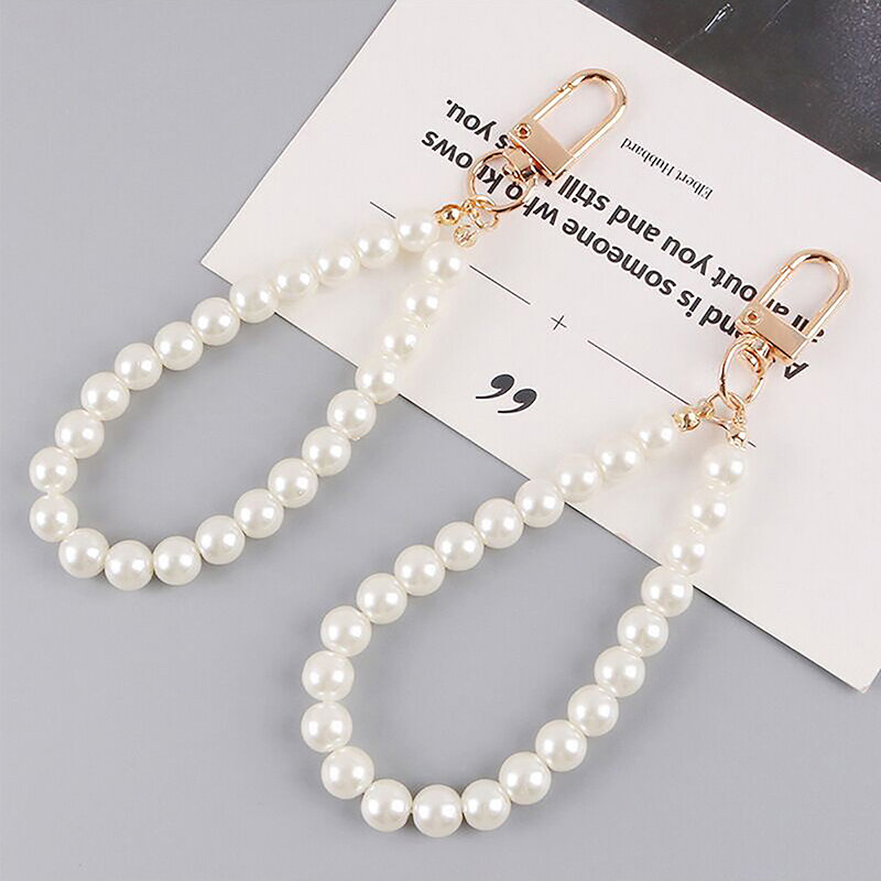 Llaveros de aleación con cuentas de perlas para mujer, bolso de coche minimalista, Auriculares Bluetooth, llaveros colgantes, accesorios de joyería