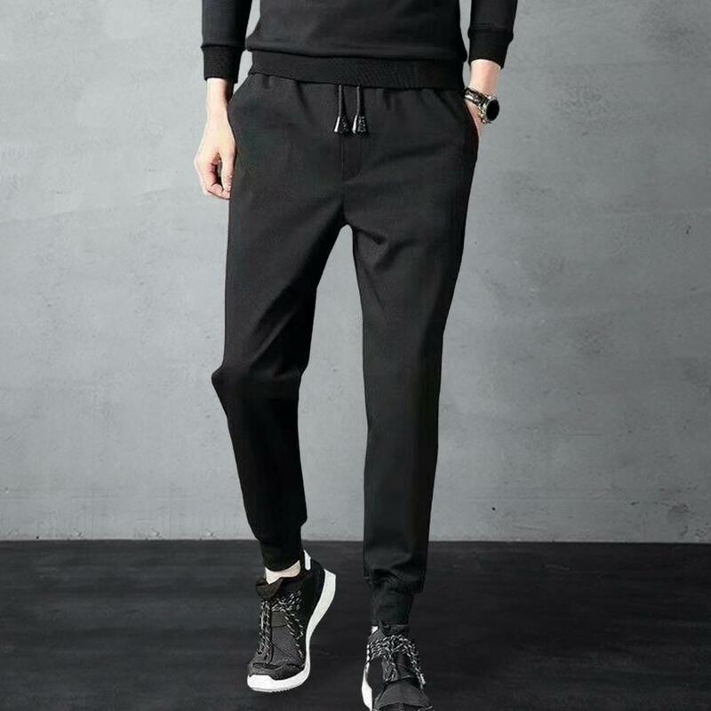 Celana Joger desain ergonomis pria, celana Joger pinggang elastis serut bulu hangat elastis untuk musim gugur/musim dingin