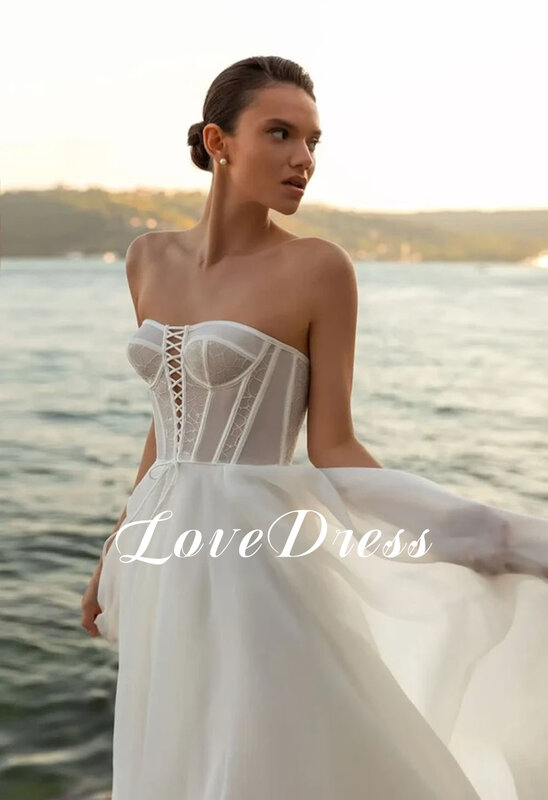 Seksowna ukochana białe suknie ślubne dla kobiet bez rękawów Organza satynowa plaża bez pleców suknie panny młodej Train de mariée