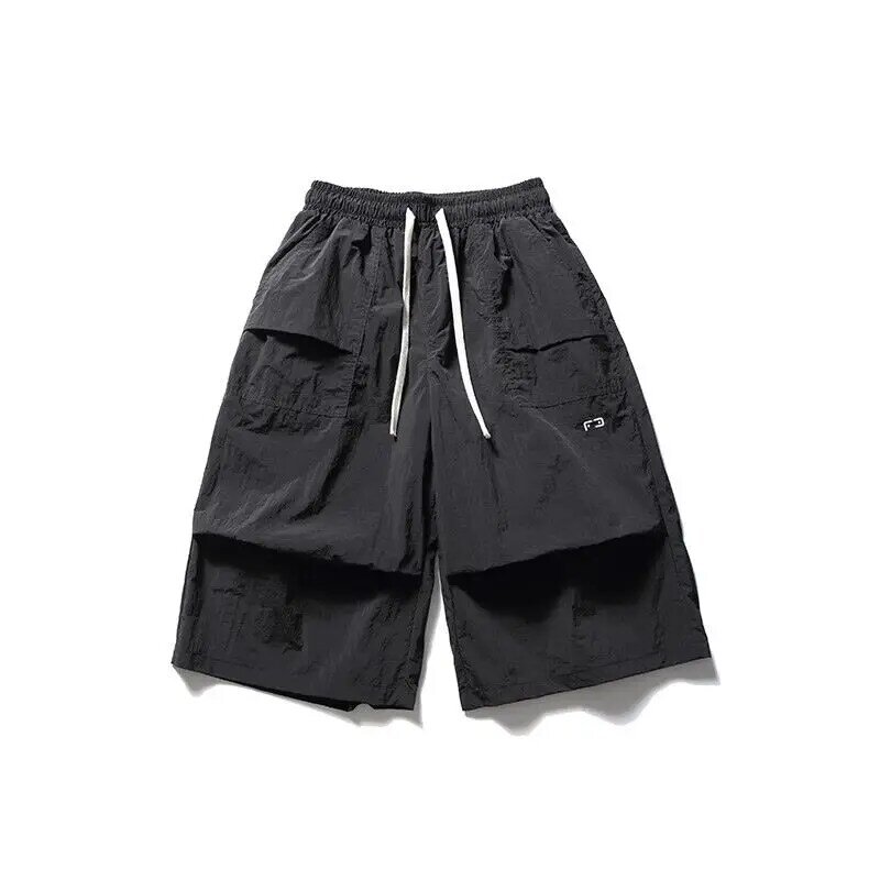 Stile giapponese Trendy 2024 estate nuovi uomini Solid tasche larghe pieghe coulisse dritto Casual elastico in vita chiamata lunghezza pantaloni