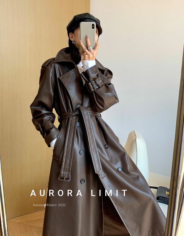 Gabardina larga de cuero Pu para mujer, abrigo marrón suelto, cinturón de doble botonadura, moda americana y europea, primavera y otoño