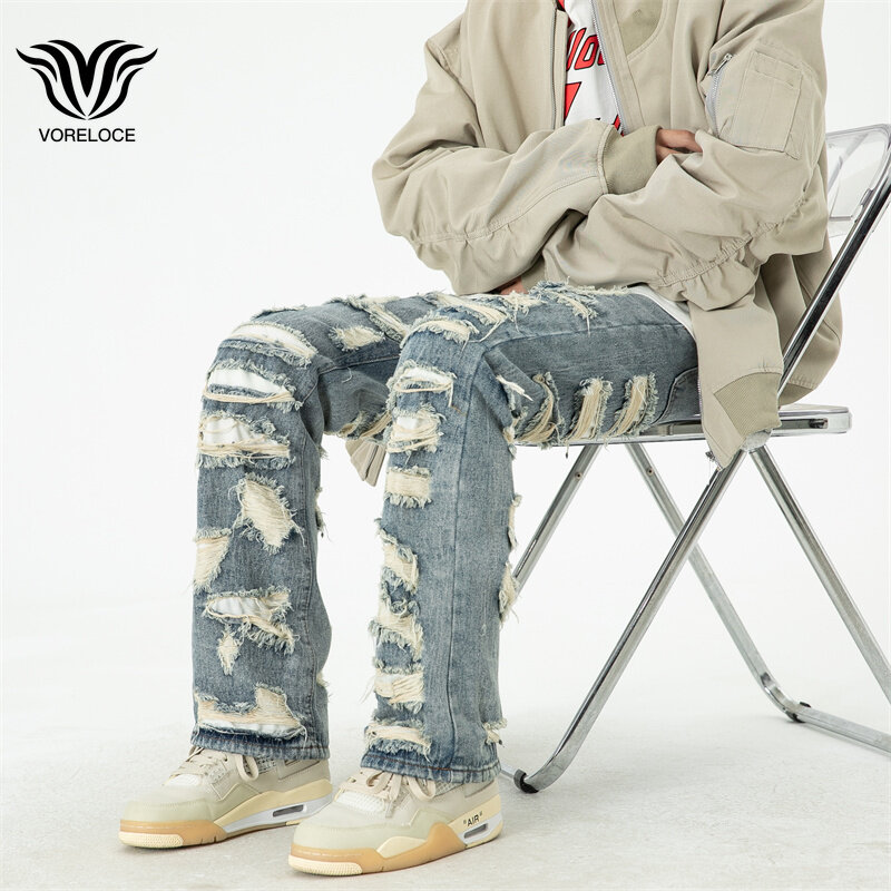 Uliczna męska Hip-hopowa porwane jeansy jesienna nowa w stylu Harajuku z kocimi wąsami wyciętymi prostymi nogawkami luźne jeansy ubrania Y2k