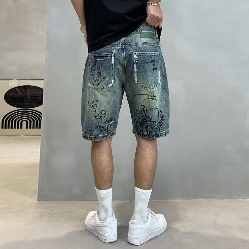 Calça jeans masculina com estampa grafite de perna reta, versátil, solta, de 5 pontos, marca de moda de rua, nova, verão