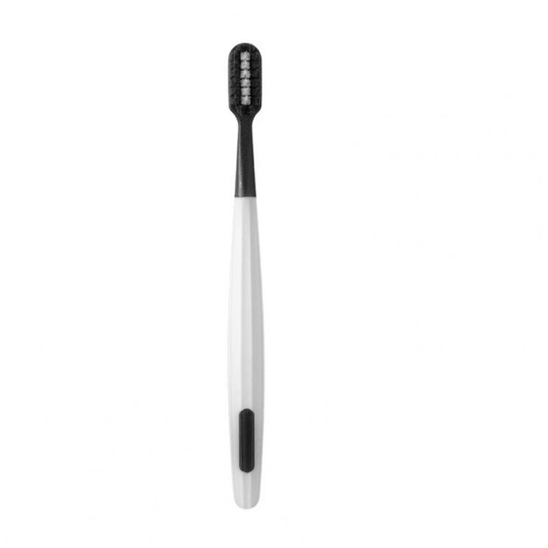 Mavericks Adventures-cepillo de dientes de cerdas suaves de plástico, duradero, compacto, blanco y negro, ergonomía para adultos