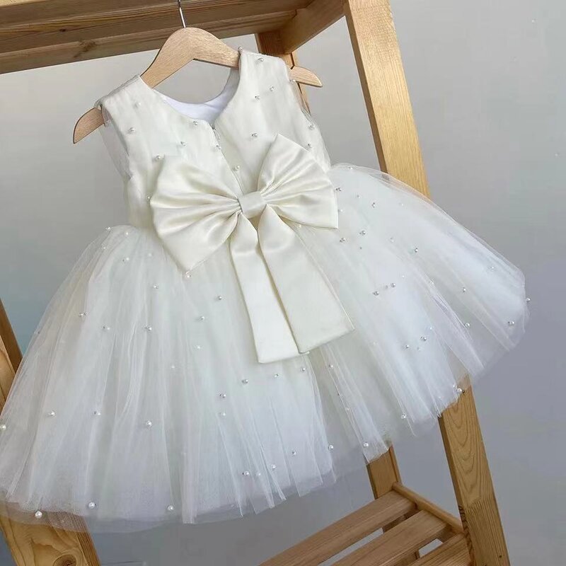 น่ารักสีขาว Tulle Puffy ดอกไม้ชุดเดรสเด็กผู้หญิงสำหรับงานแต่งงาน2023เจ้าหญิงไข่มุกลูกปัดแขนกุดเข่าความยาว First Communion Gowns