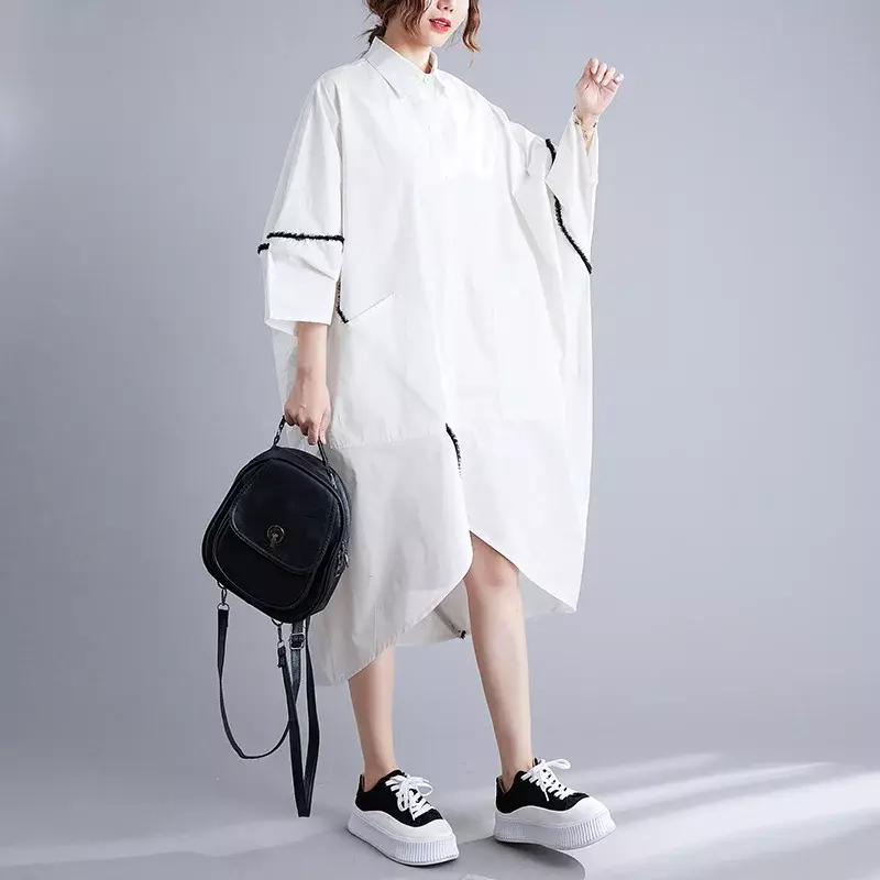 女性の非対称の白いシャツドレス,大きなポケット,フロントボタン,ミドル丈の襟,バットウィングスリーブ,夏,2024