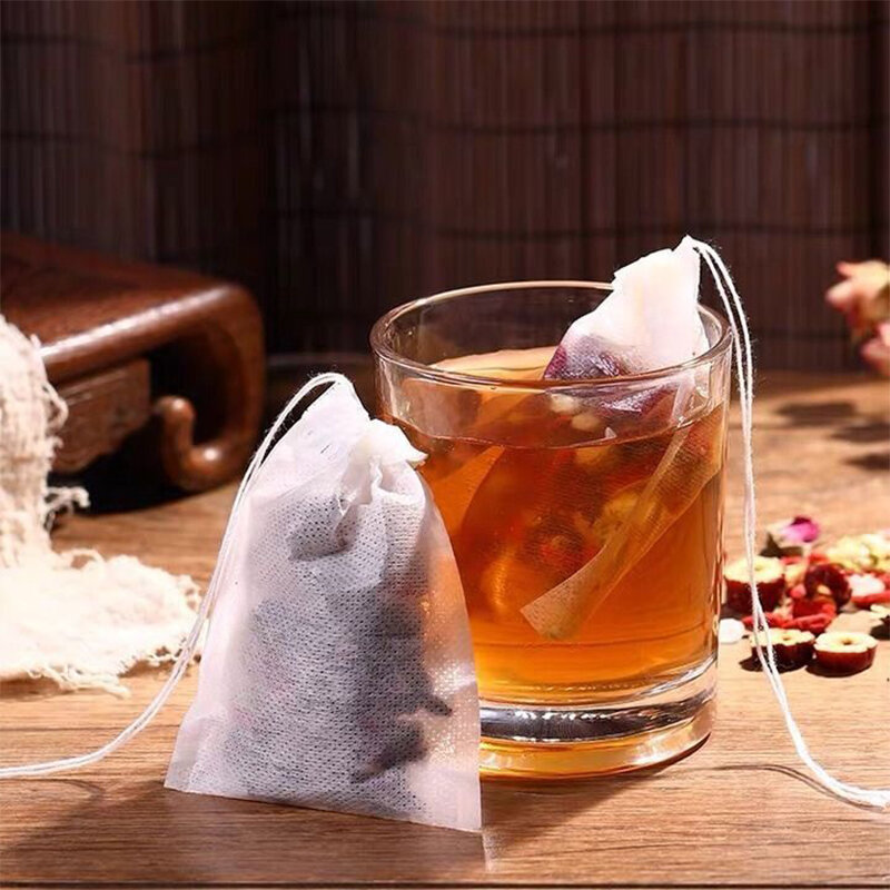 Sacchetti filtro per tè usa e getta da 50 pezzi per infusore per tè e caffè filtri per spezie in tessuto Non tessuto sigillo con coulisse bustine di tè vuote