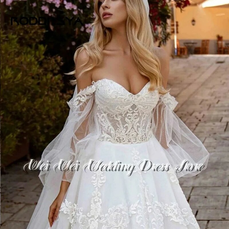 Elegant Off Shoulder Lace-Up Tulle Lace Appliques Princess Ball Gown Wedding Dress 2023Long Puff Sleeves Bridal Robes de mariée