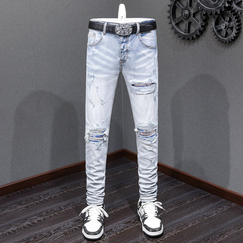 Modne dżinsy męskie uliczna światło Retro niebieska elastyczna elastyczna chudy krój porwane jeansy mężczyzn załatana dziura projektant Hip Hop markowe spodnie