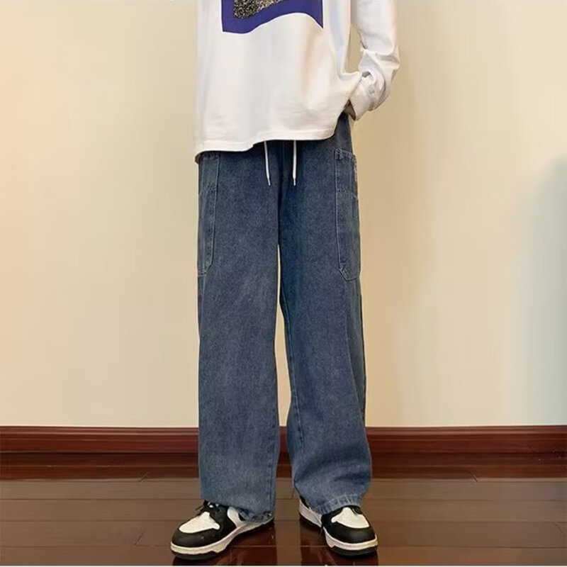 Celana panjang Denim longgar pria, Jeans longgar kaki lebar kantong besar pinggang elastis Streetwear Musim Semi dan Gugur 2024