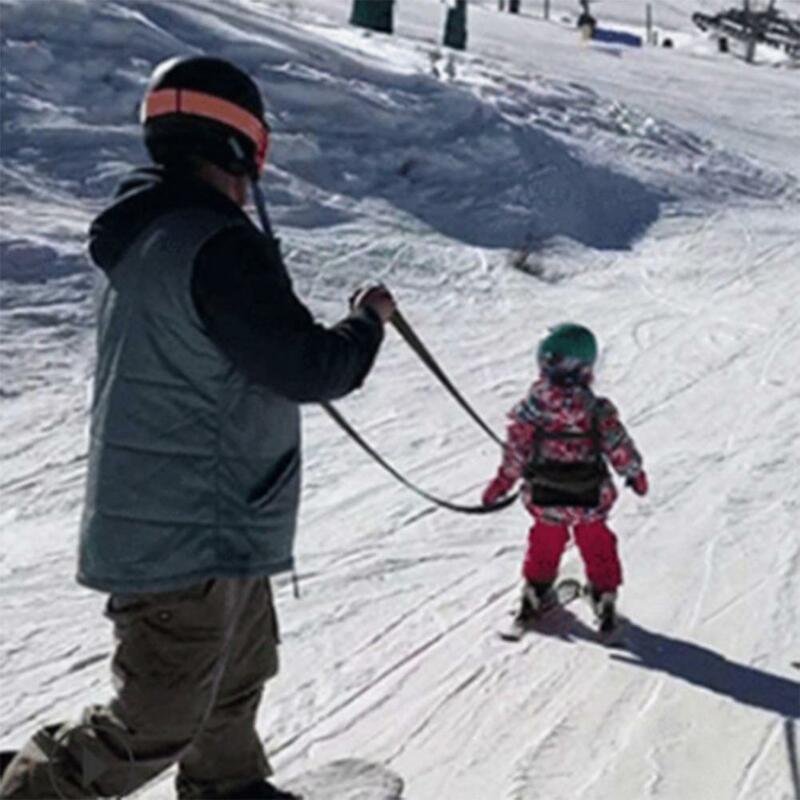 สายคาดไหล่สำหรับเล่นสกีพร้อมเชือกลากสายรัดนิรภัยสำหรับเด็กเล่นสกีใช้งานได้หลากหลาย