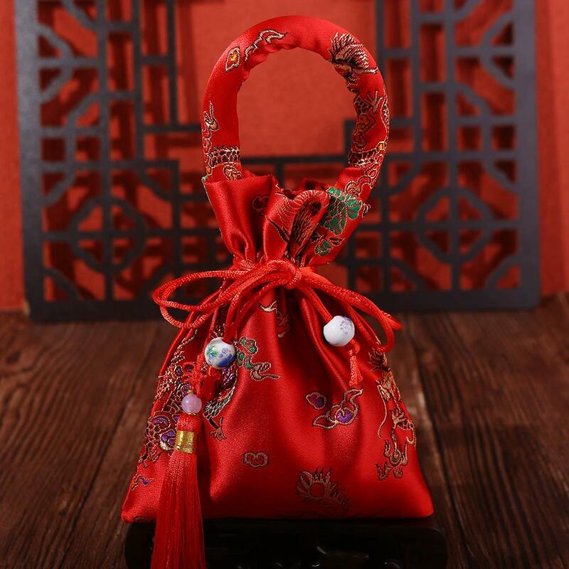 Tas serut merah pernikahan dengan rumbai brokat pengantin wanita dan pengantin pria permen tas paket hadiah kesukaan pernikahan