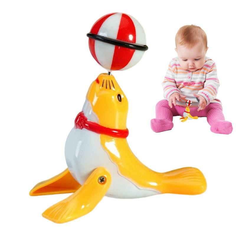 Top Ball Clockwork Mainan Lumba-lumba Berliku Rotasi Singa Laut Dekompresi Akrobatik Hadiah Anti Stres untuk Anak-anak Bayi