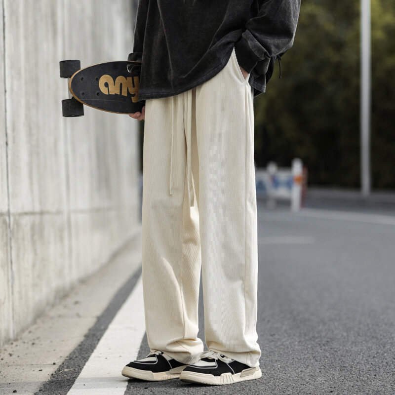 Celana Joger lurus longgar pria, bawahan olahraga kasual pinggang elastis Streetwear Musim Semi
