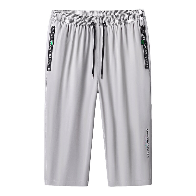 Tasche stringate elastiche alla moda pantaloni Casual con lettera stampata abbigliamento uomo 2024 estate nuovi pantaloni Capri dritti larghi All-match