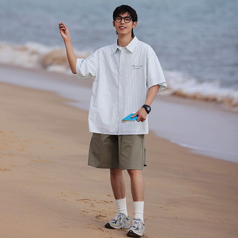 Abbigliamento da uomo camicetta estiva Top Plaid camicie a maniche corte camicie da spiaggia di marca Streetwear coreane a righe per uomo di alta qualità 2023