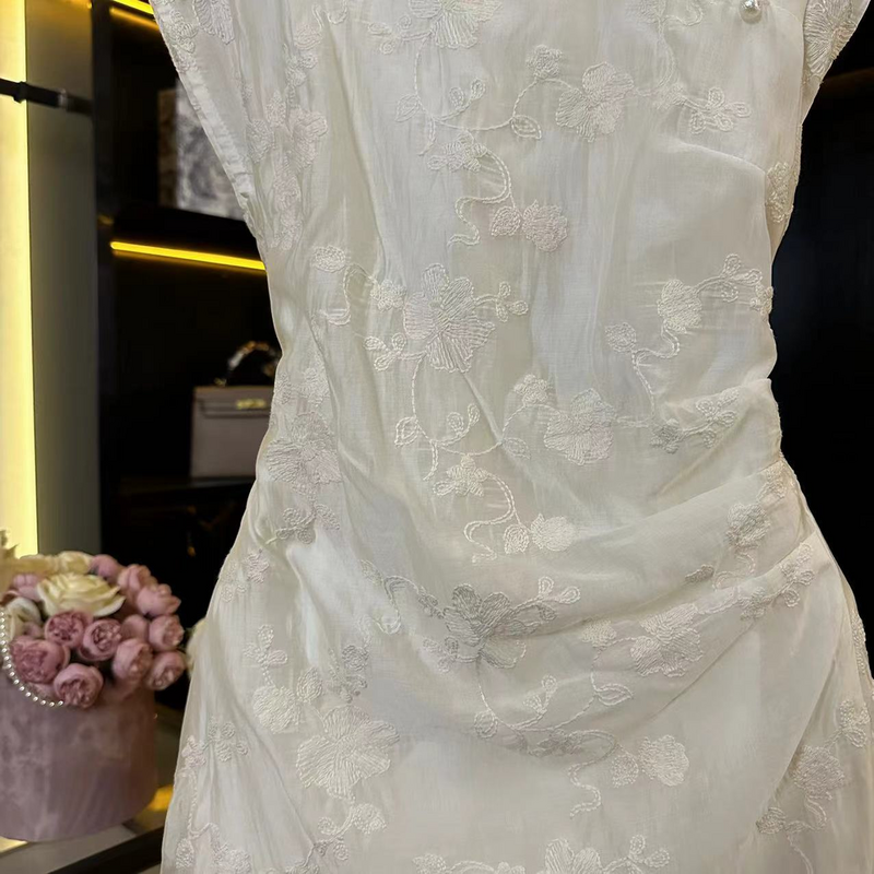 Weißes Kleid weiblich 2024 Sommer mode Temperament schlank bestickt ärmellose gefälschte zweiteilig lang.