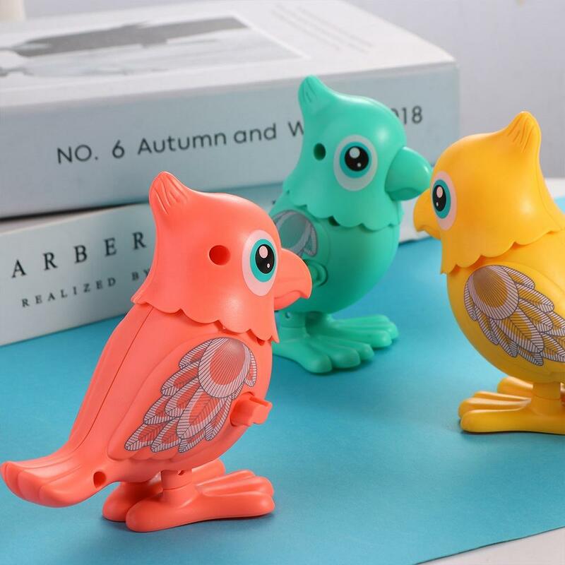 Mainan hewan beo angin mainan indah plastik kartun klasik rantai jam mainan orang tua-anak