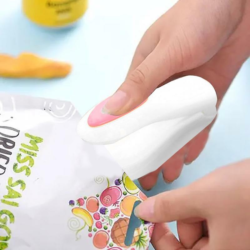 Tragbare Mini-Versiegelung Haushalts maschine Hand beutel Heiß siegel Versch ließer Lebensmittels parer für Plastiktüten Paket Küchen helfer