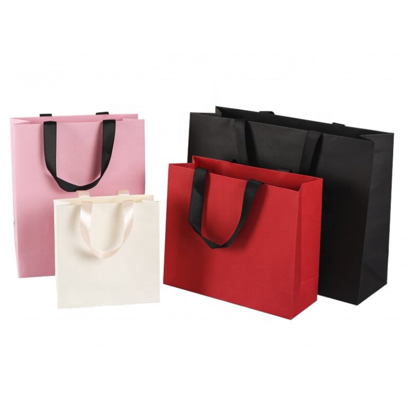 Customized product、Custom Gold Logo Matt Black Craft Shopping Bag Large Luxury White Packaging Paper Bags For Clothing