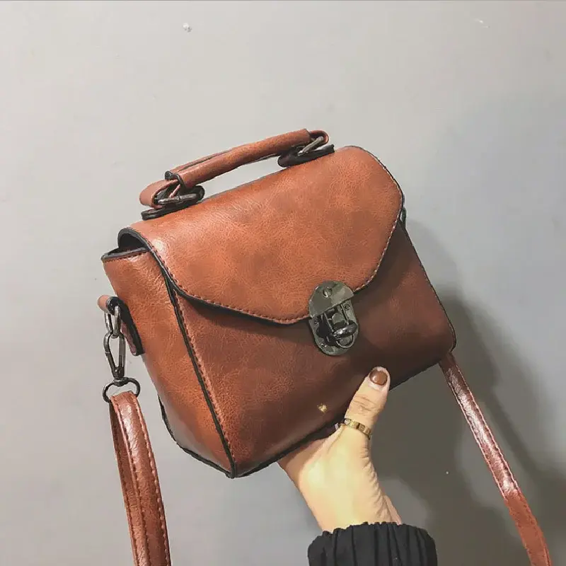 Nowa Vintage mała torba kwadratowa modna damska torba na ramię z obrotowym zamkiem prosta Retro przenośna torebka ze skóry PU