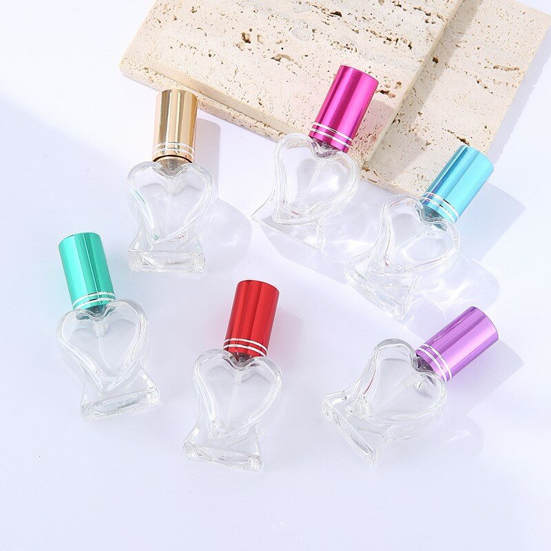 Botella de Perfume en forma de corazón, atomizador de Perfume recargable portátil colorido, contenedor de maquillaje vacío, botella de Spray de niebla, 10ml