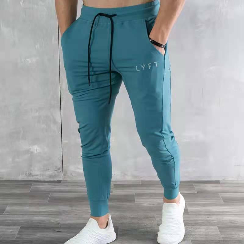 Fitness mięśniowy jesienne i zimowe nowe spodnie sportowe codzienne męskie spodnie koreański styl Slim-fit spodnie do fitnessu spodnie do kostek męska