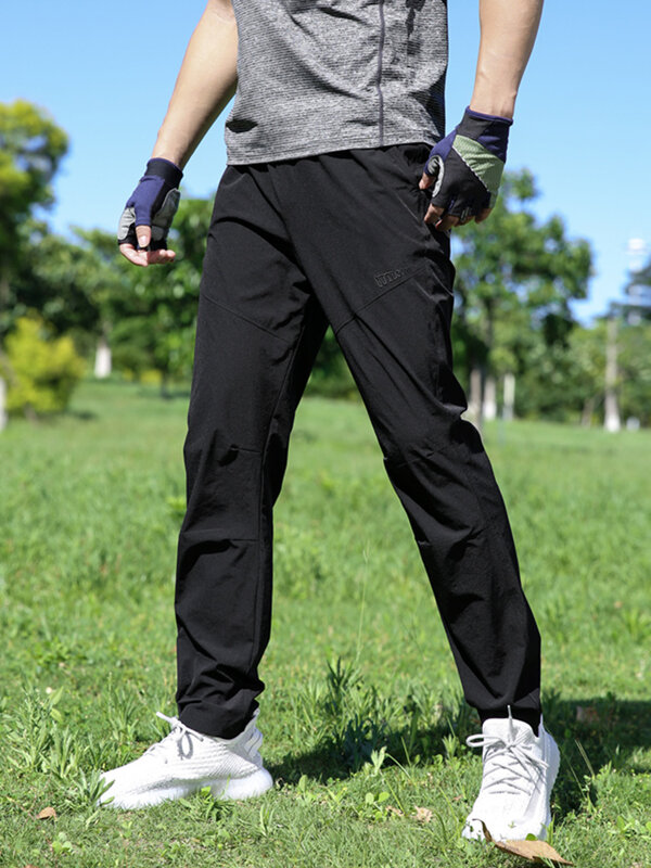 Letnie jasne i cienkie spodnie dresowe męskie oddychające szybkoschnący sportowy spodnie do golfa męski rozciągliwy nylonowy swobodny długi spodnie do biegania