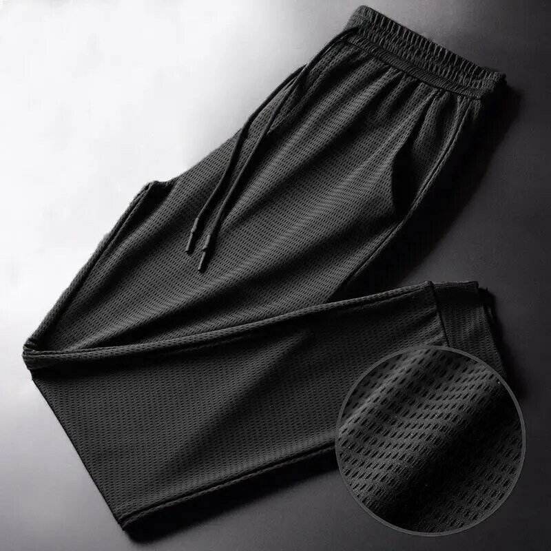 กางเกงผ้าตาข่ายผ้าไอซ์ซิลค์สำหรับผู้ชายกางเกงฟิตเนสกางเกงรัดข้อเท้าผ้ายืดลำลองระบายอากาศได้ดีฤดูร้อน