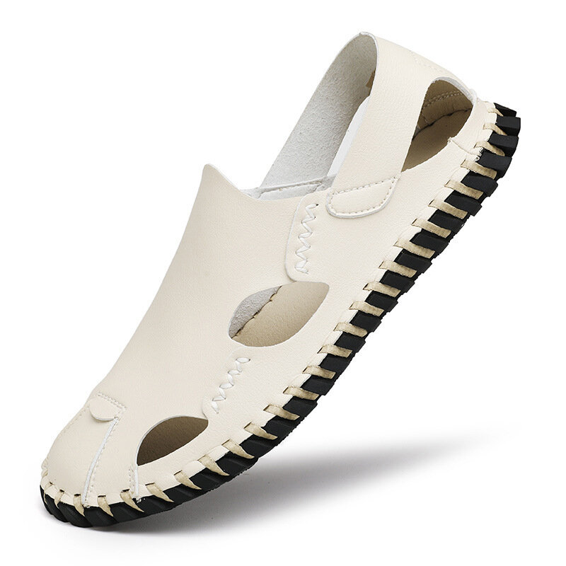 Sandal pria musim panas berongga sepatu kasual pria jahitan lembut sandal Baotou sandal kulit Fashion Non-slip sepatu pantai untuk pria