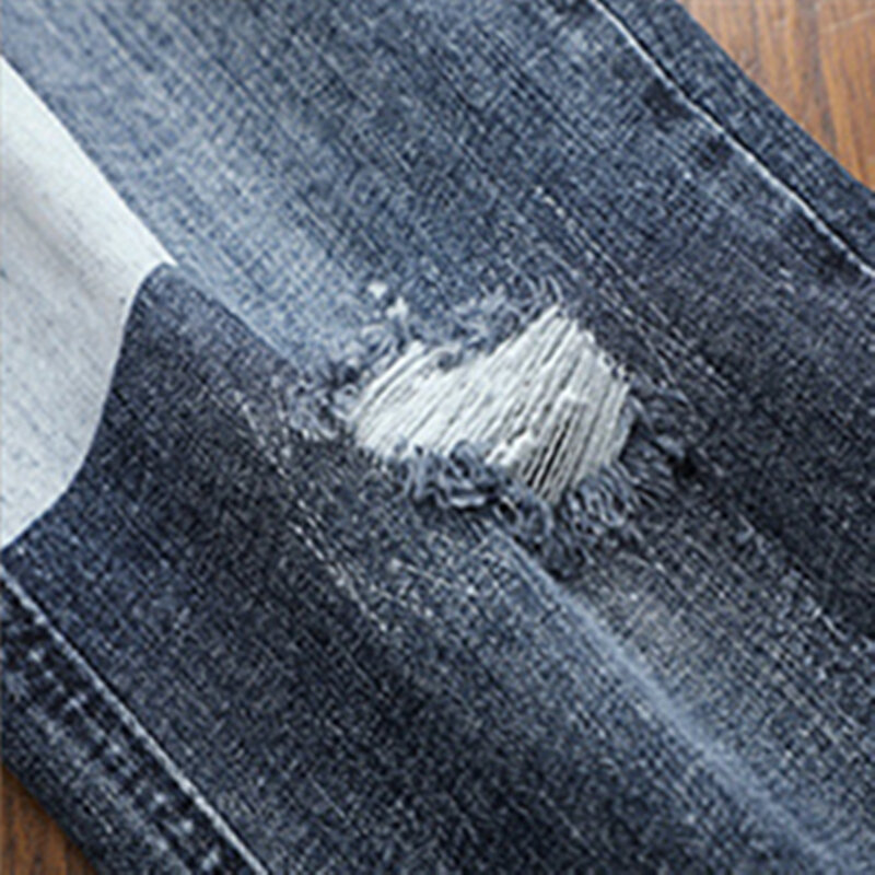Nova moda rasgado costura jeans men mid-waisted casual calças de lápis fino hip hop streetwear