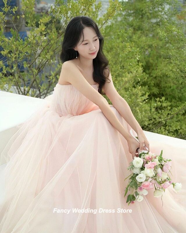 ชุดแต่งงานสีชมพูเกาะอกสง่างามชุดราตรียาวคลุมเข่าผ้าทูลแขนกุดแบบเกาหลีชุดราตรียาวลากพื้น