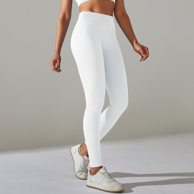 Solidny biały legginsy damskie bezszwowe legginsy gimnastyczne szybkie suche spodnie do fitnessu wysokiej talii spodnie do biegania biodra Push Up legginsy sportowe