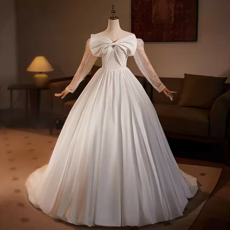 فساتين زفاف بيضاء أنيقة مع قوس ، ثوب كرة ساتان ، كم طويل ، وهم ، ثوب زفاف ، صورة حقيقية ، ، ، ، من من من من