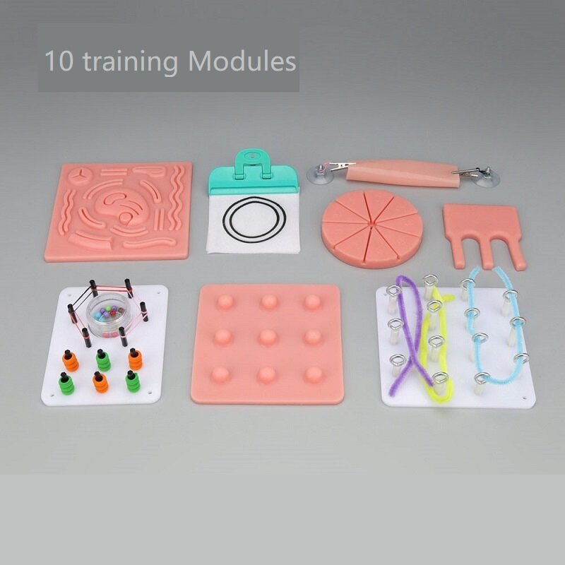 Caixa do treinamento do simulador laparoscópico, instrumentos, câmera, porta-agulha